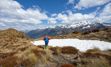 Hiker on the summit of Mount Alfred