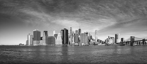 View from Pier 1 over the East River to the skyline of Lower Manhattan with Brooklyn Bridge