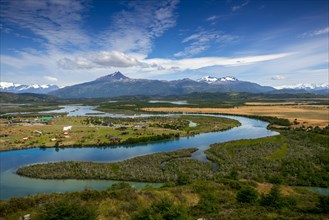 View of the Torres del Paine National Park and the Rio Serrano River to the settlement of Villa Rio Serrano