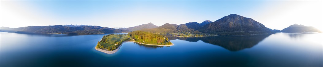 360 degree panorama of Walchensee with peninsula dwarfs in the morning light