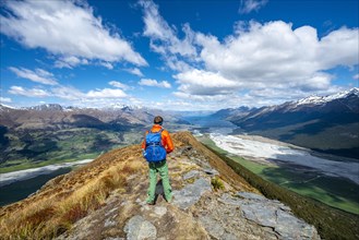 Hiker on the summit of Mount Alfred