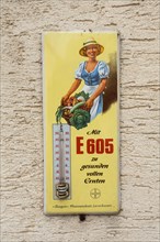Historical thermometer with advertisement for the now banned plant poison E 605 of the company Bayer AG