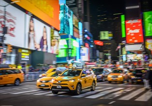 Typical yellow taxis in traffic