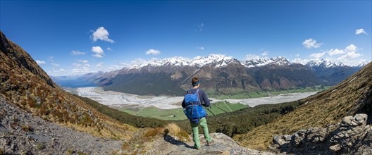 Hiker on the summit of Mount Alfred