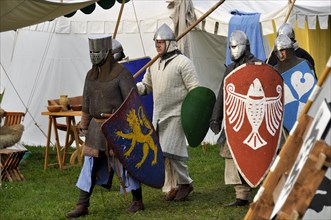 Knight with helmets and shields