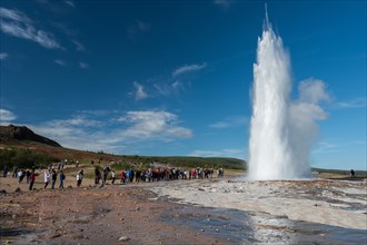 Tourists watching eruption