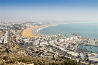 Modern architecture and sandy beach in Agadir