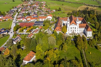 Aerial view of Schlehdorf Monastery with St. Tertulin Parish Church at Lake Lake Kochel