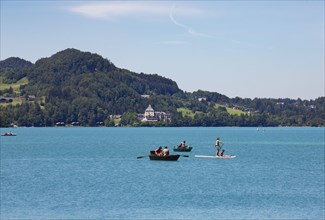 Boats at the Fuschlsee with castle Fuschl
