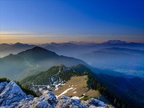 View from the Kampenwand to the Chiemgau and Berchtesgaden Alps at sunrise