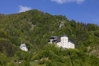Castle Klaus with mountain church
