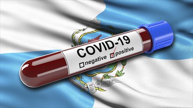 Flag of Rio de Janeiro waving in the wind with a positive Covid-19 blood tube