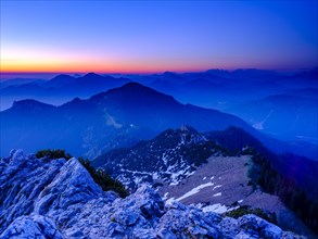 View from the Kampenwand to the Chiemgau and Berchtesgaden Alps at dawn