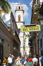 The Bodeguita del Medio and the bell tower of the cathedral behind