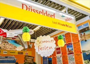 Travel agencies at Duesseldorf Airport offer summer holidays in times of the Corona Pandemic