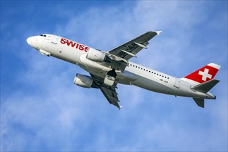 Swiss Airbus A320-214 aircraft takes off at Duesseldorf International Airport