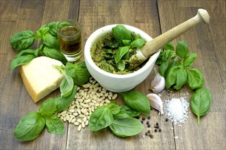 The ingredients for making basil pesto