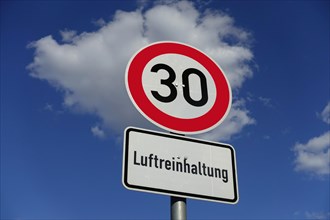 Speed limit 30 sign and air pollution control