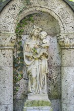 Tomb with statue of the Virgin Mary and Child Jesus