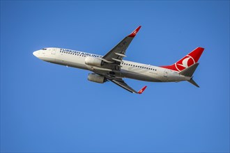 Turkish Airlines Boing 737-8F2 aircraft takes off from Duesseldorf International Airport