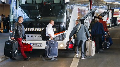 Romanian harvest workers land at Duesseldorf airport with special machines and travel by bus to the farms