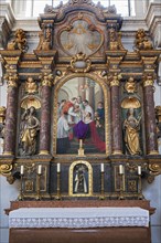 Side altar with figures of saints and black Madonna
