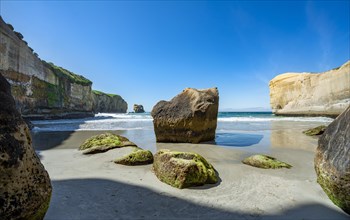 Sand beach with sandstone cliffs
