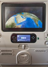 Screen showing the flight position Dubai at seat in aircraft