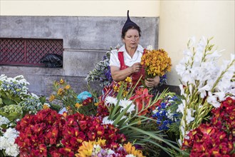 Flower seller in traditional clothing