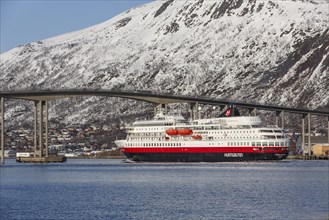 Hurtigruten vessel MS Finnmarken under the Tromso Bridge