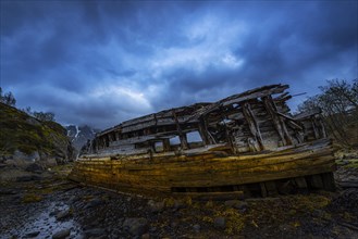 Derelict shipwreck on shore
