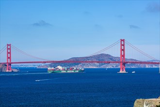 Container ship under Golden Gate Bridge