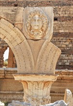 Columned arch with a Medusa head