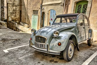 Oldtimer Citroen 2CV in an alley in the old town