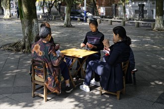Locals playing cards
