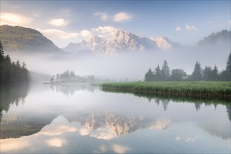 Alpine lake with reflection