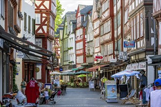Shopping street with historic half-timbered houses