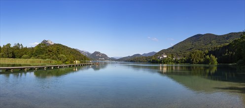 Bathing beach at the Fuschlsee with Fuschl Castle