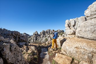 Young man on a hiking trail