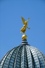 Gilded figure of Fama on the dome of the Academy of Fine Arts