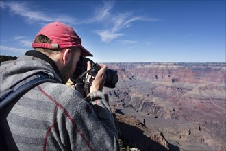 Tourist photographed in Grand Canyon