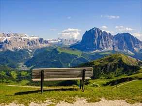 Lookout bench at the top of the Seceda with views of the Sella Group