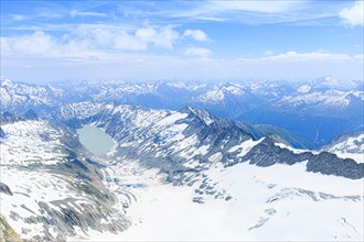 View from Oberaarhorn in direction Grimselpass to Oberaar Glacier and Oberaarsee