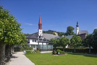 Lake promenade with pile-dwelling village pavilion and protestant church