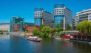 Excursion boat on the river Spree at Spreebogenpark in Berlin Moabit