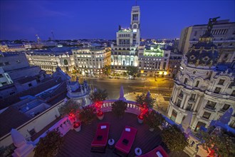 Clients enjoy the beautiful location of the terrace at the Principal Hotel in Gran Via avenue