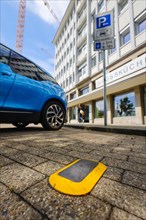 Parking space sensors show car drivers via displays of Smart Poles