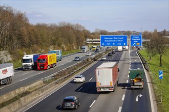 Trucks and cars drive on the A2 motorway