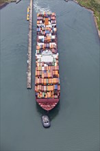 A Neo-Panamax container ship heading to the Atlantic side in Panama Canal