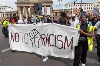People demonstrate in Berlin against racism